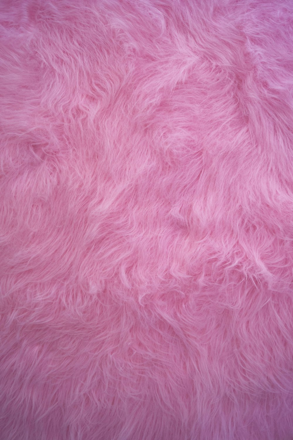 pink textile in close up photography