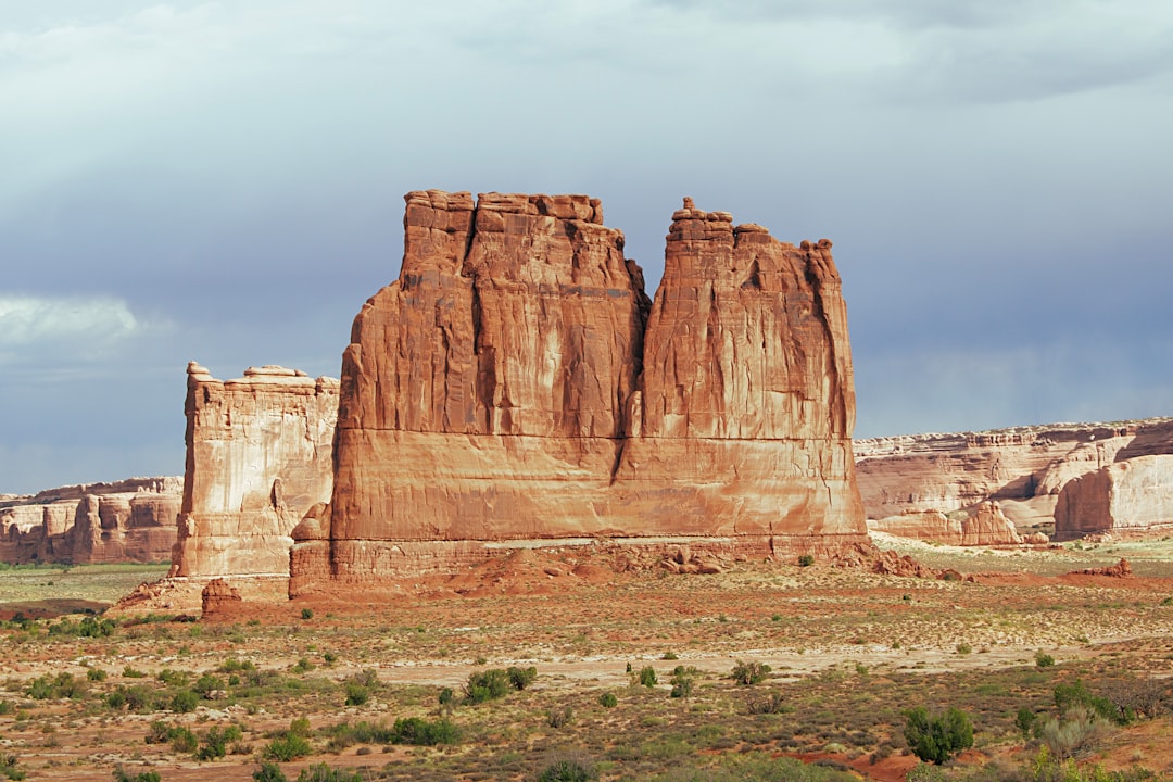 brown rock formation under blue sky during daytime