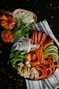 sliced tomato and green vegetable salad