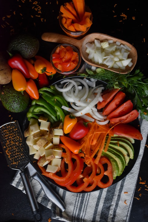 sliced carrots and green vegetable salad