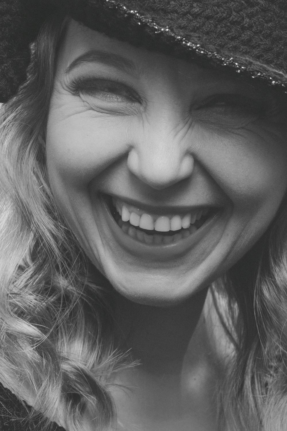 smiling woman in black shirt