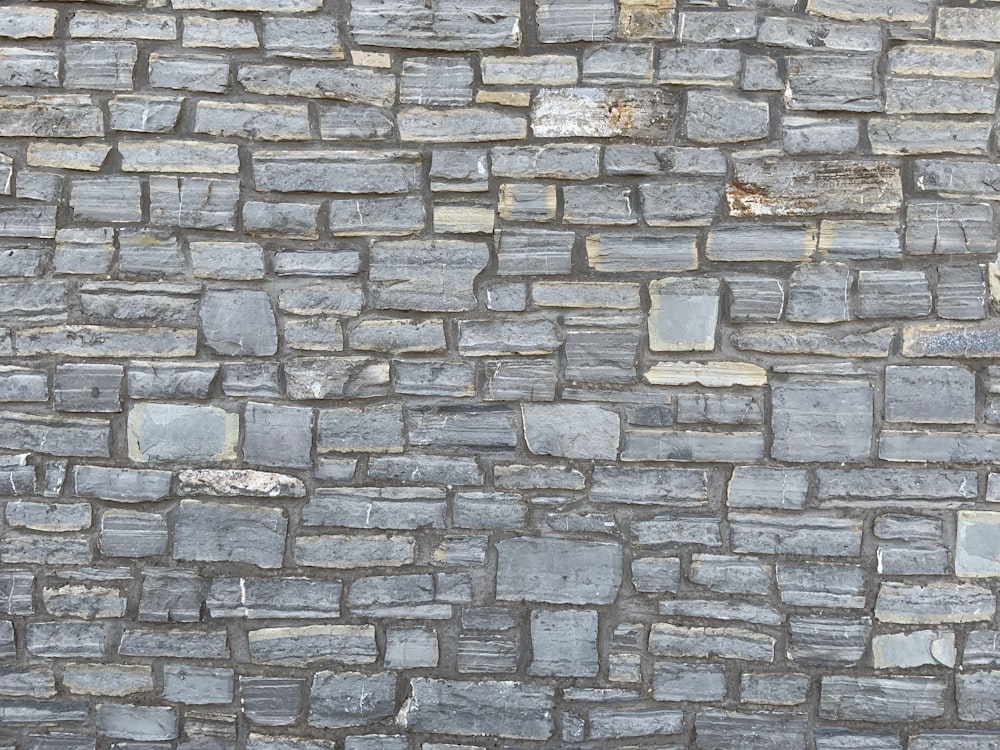 brown and grey brick wall