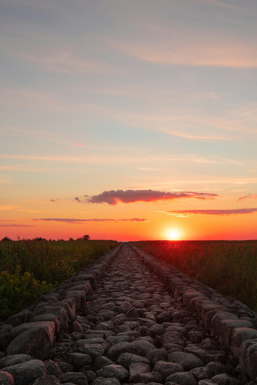 gray rocky road during sunset