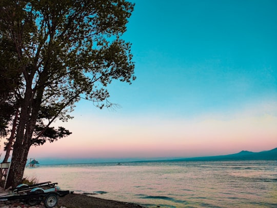 black suv on beach during daytime in Sevan Armenia