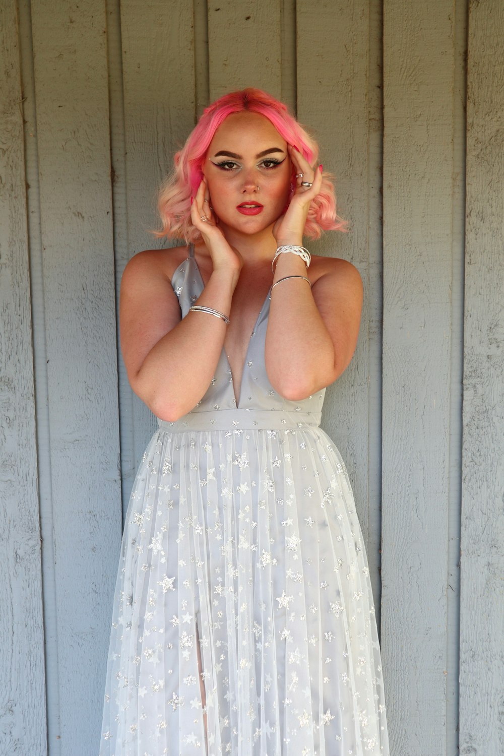 woman in white sleeveless dress