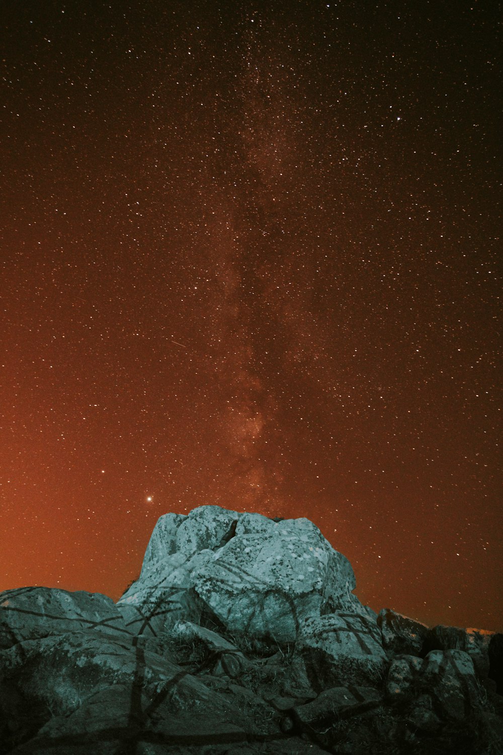 rocky mountain under starry night