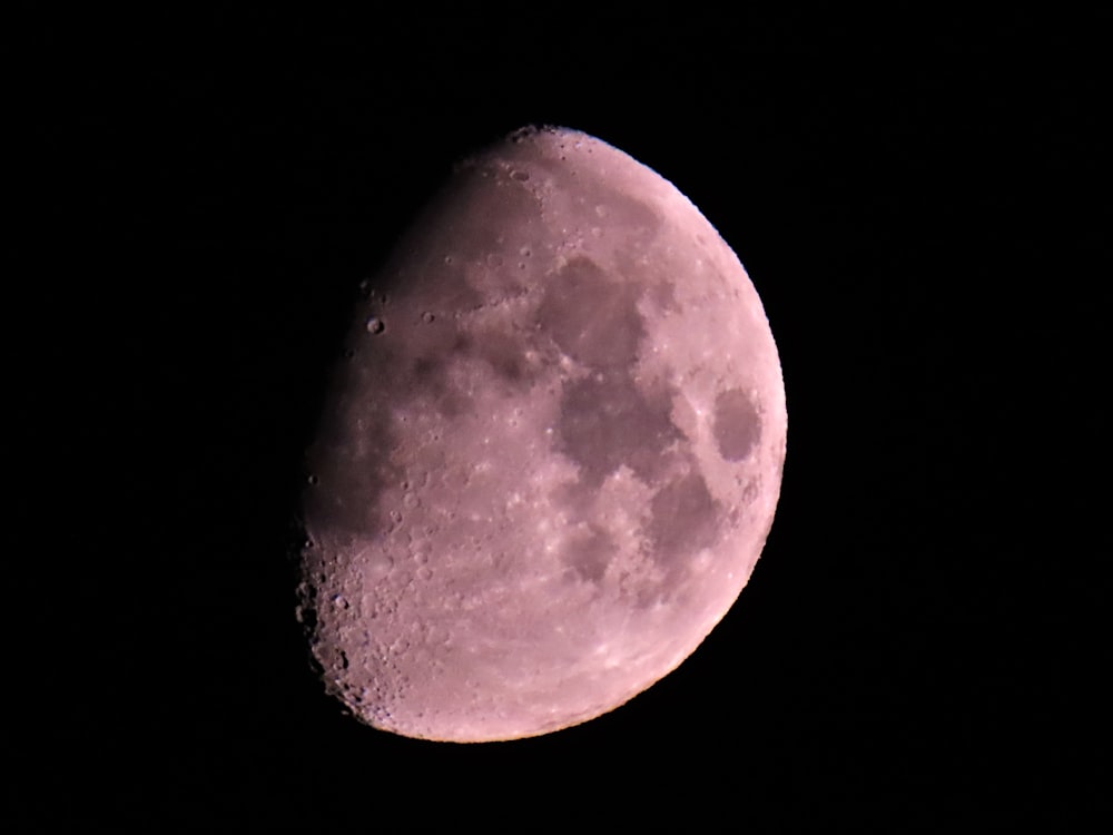 red moon in black background