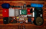 assorted items on brown wooden table