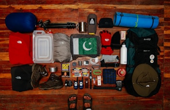assorted items on brown wooden table