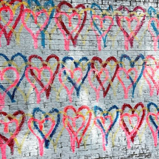 Volunteers painting the walls of a nursing home, bringing warmth and color to the residents' daily lives.