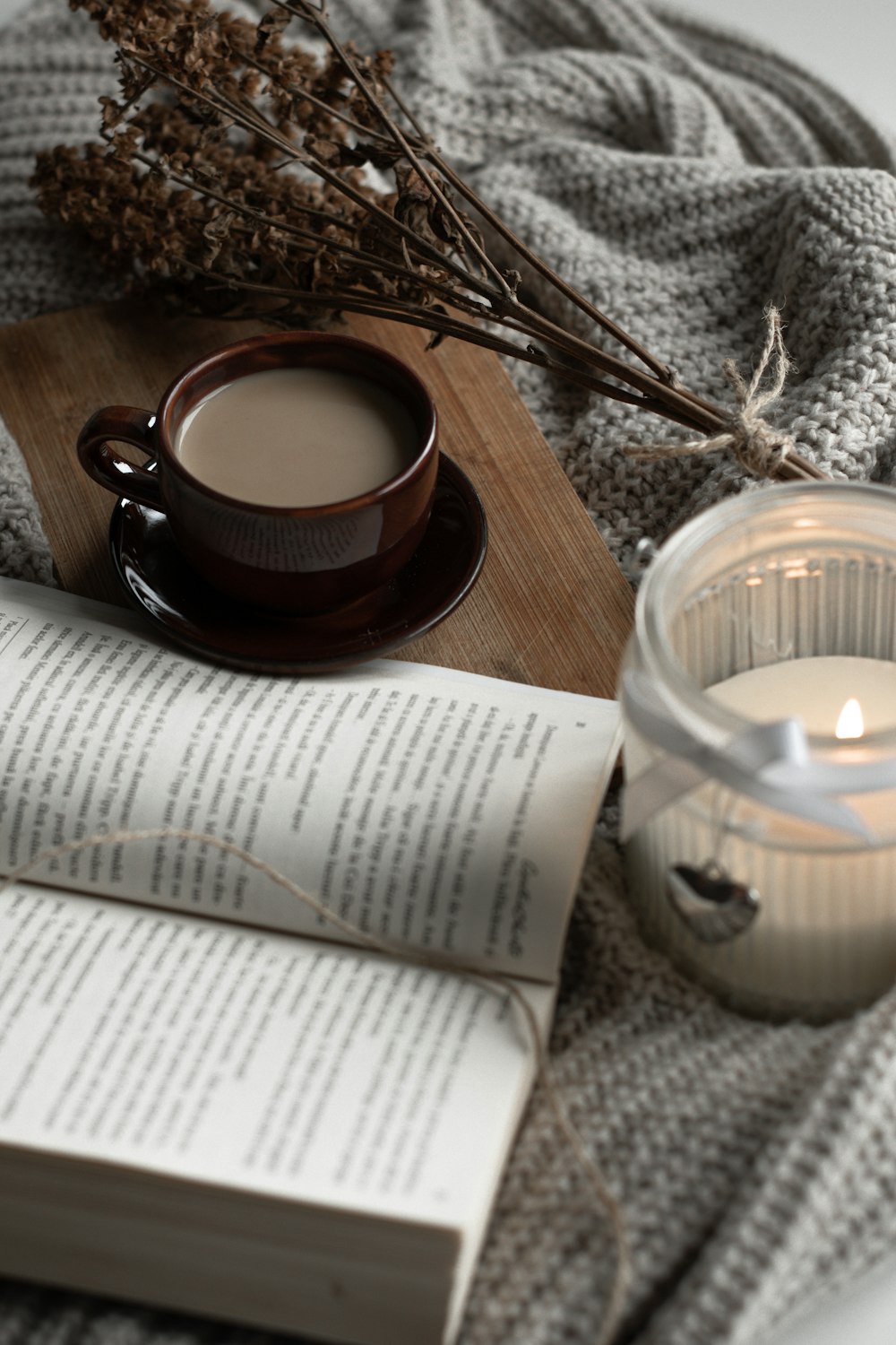 brown ceramic mug on brown wooden table