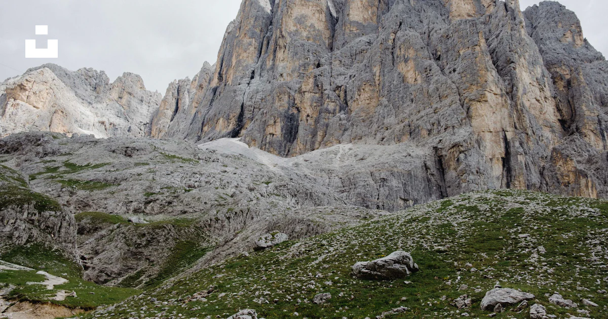 Gray rock formation on green grass field during daytime photo – Free ...