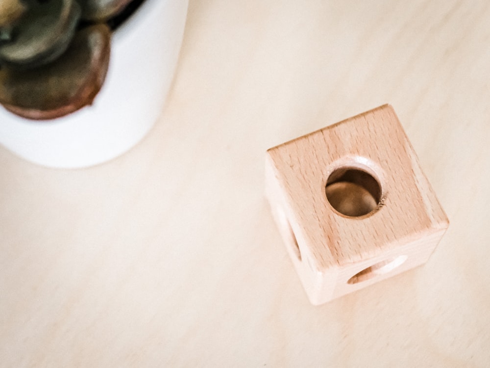 brown wooden chopping board on white table