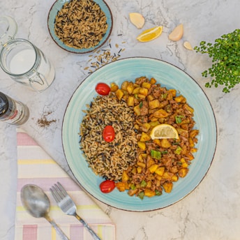 brown peanuts on white ceramic bowl