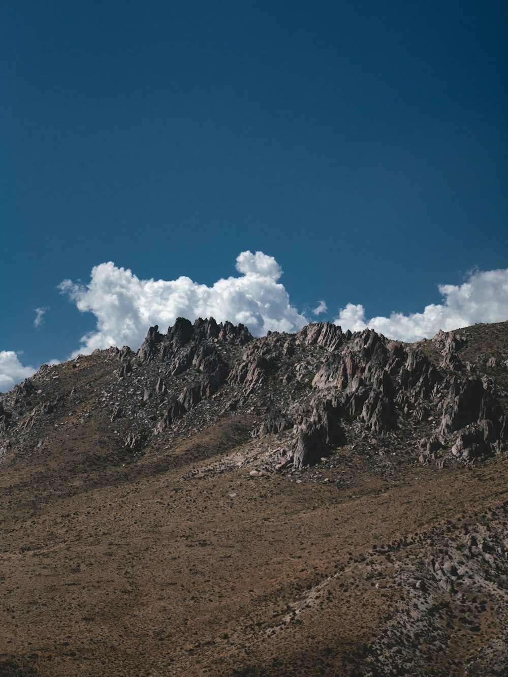 brown and gray mountain under blue sky during daytime