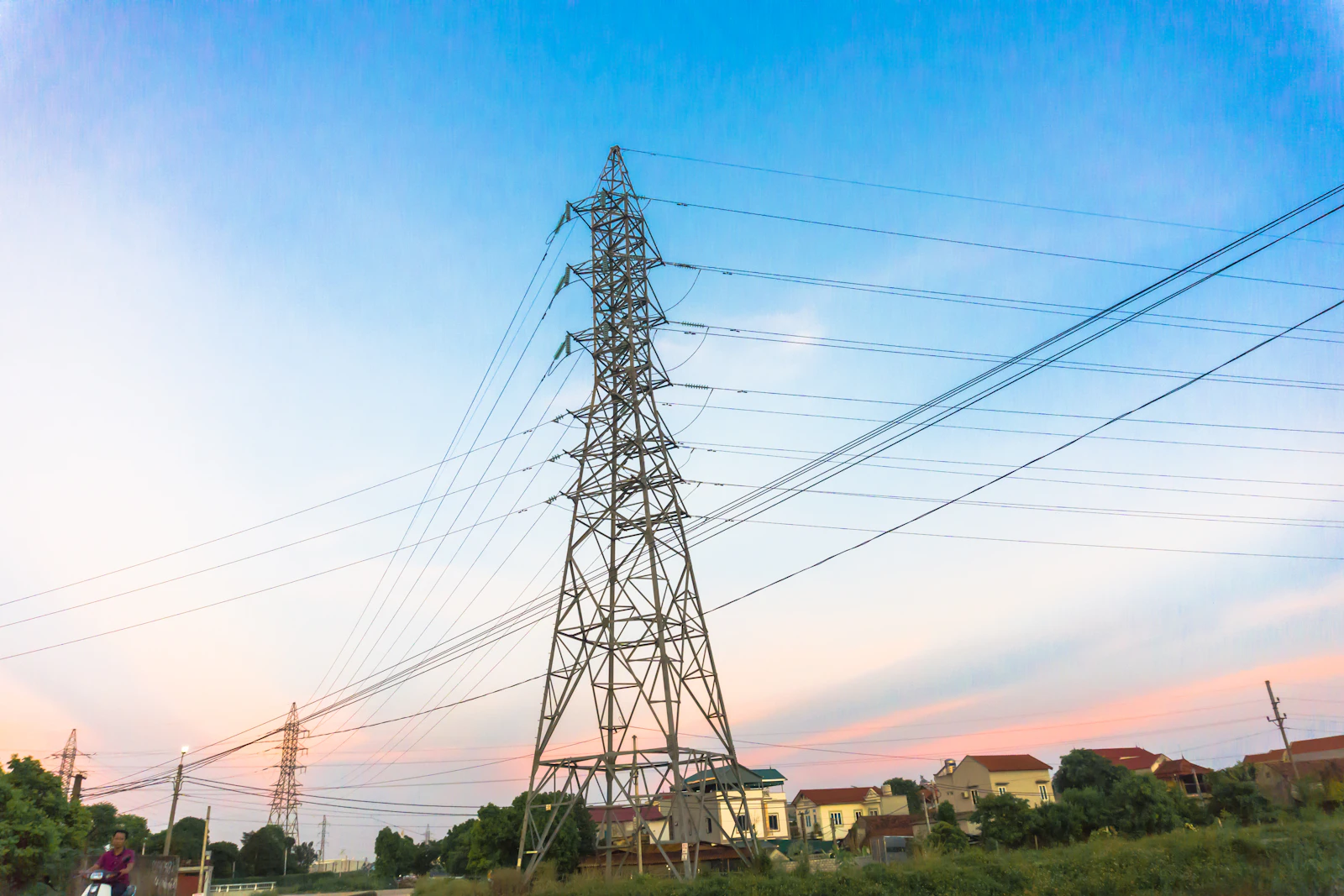 transmission tower under a blue sky
