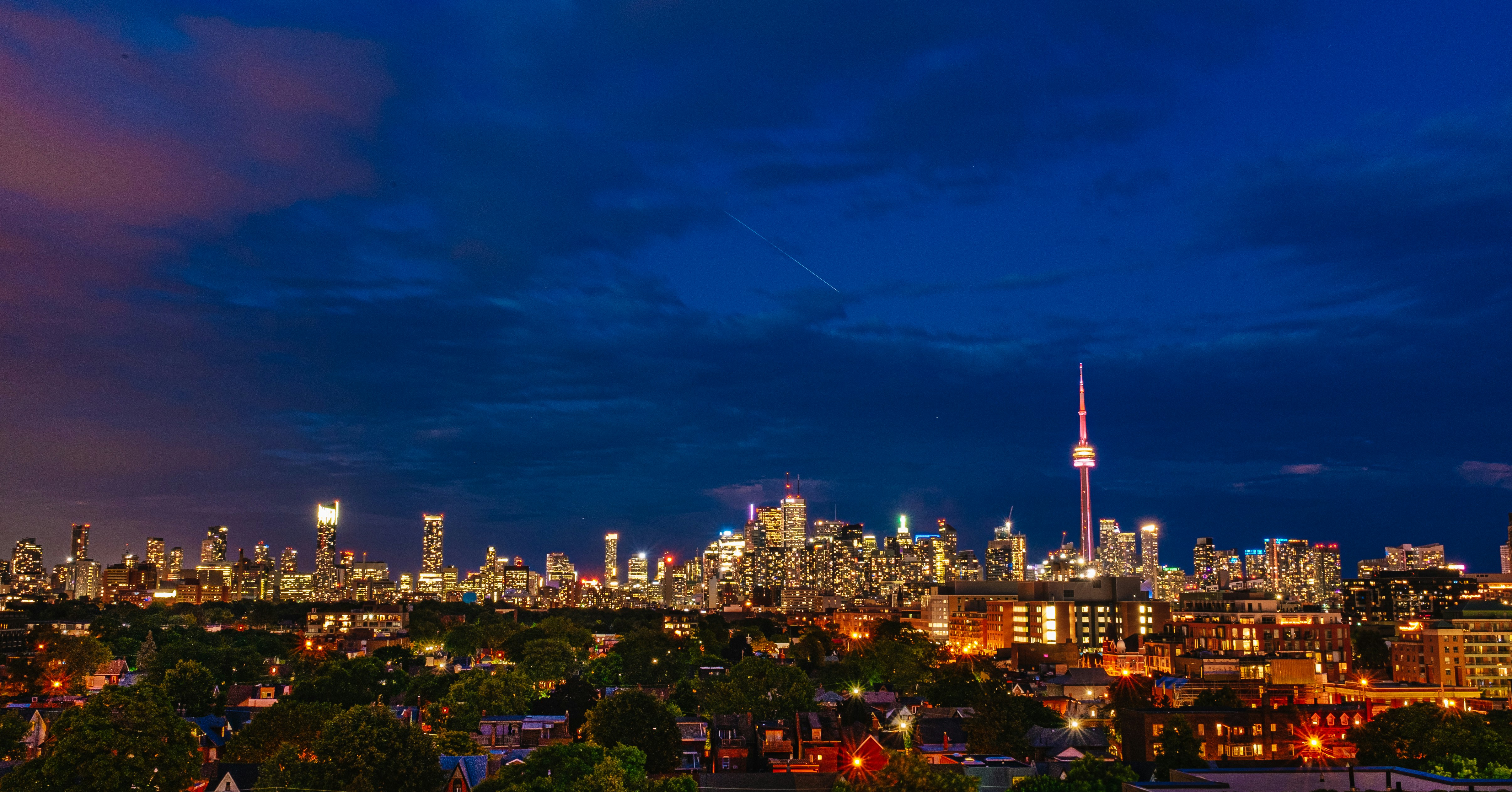 city skyline during night time