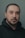 man in black hoodie taking selfie