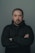 man in black hoodie standing