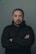 man in black hoodie standing