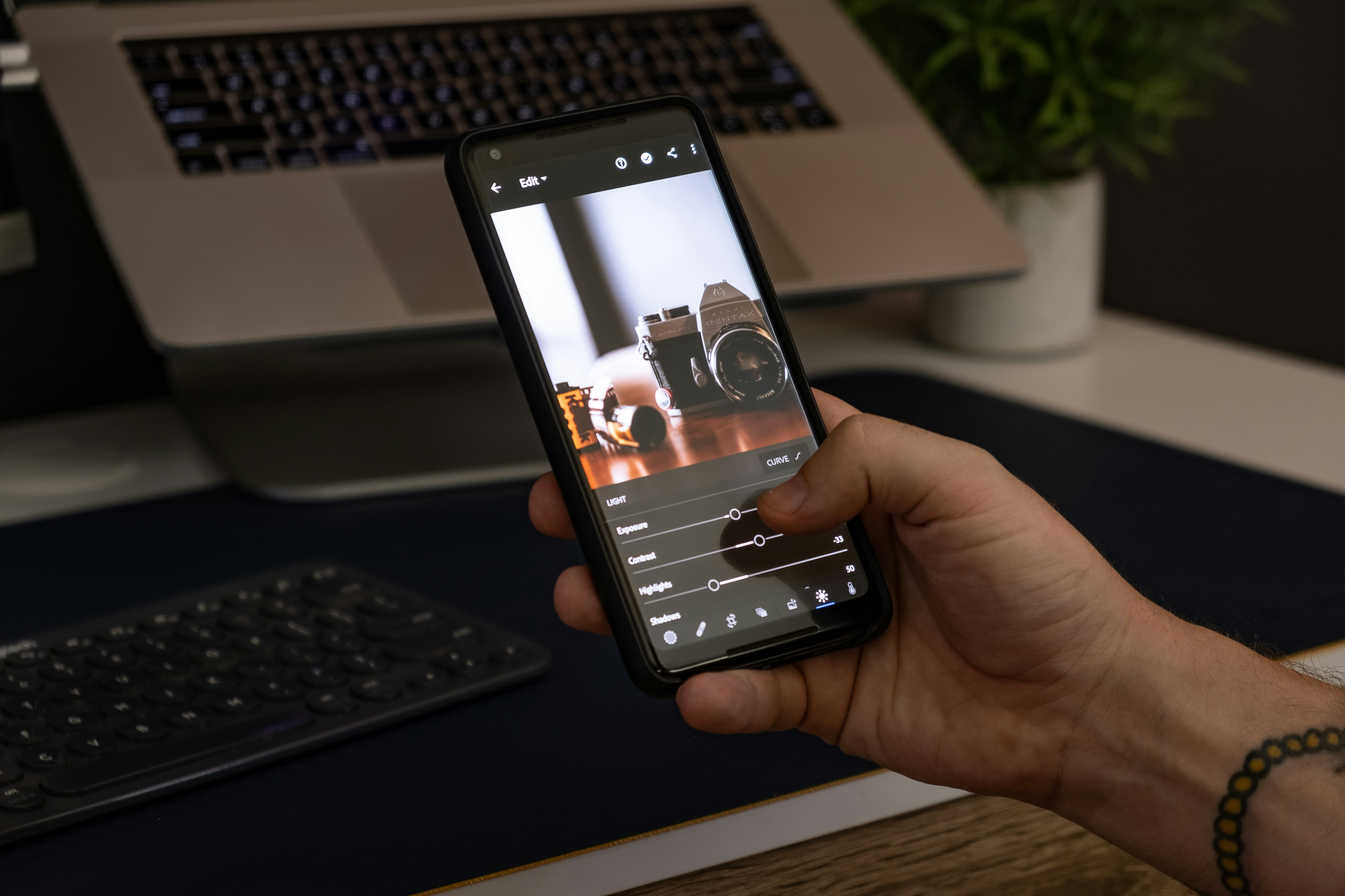 person holding black android smartphone