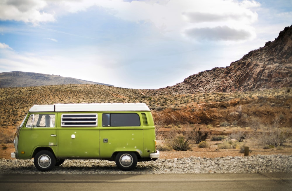 green van on road during daytime