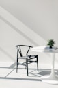 white wooden table with chairs