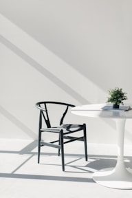 white wooden table with chairs