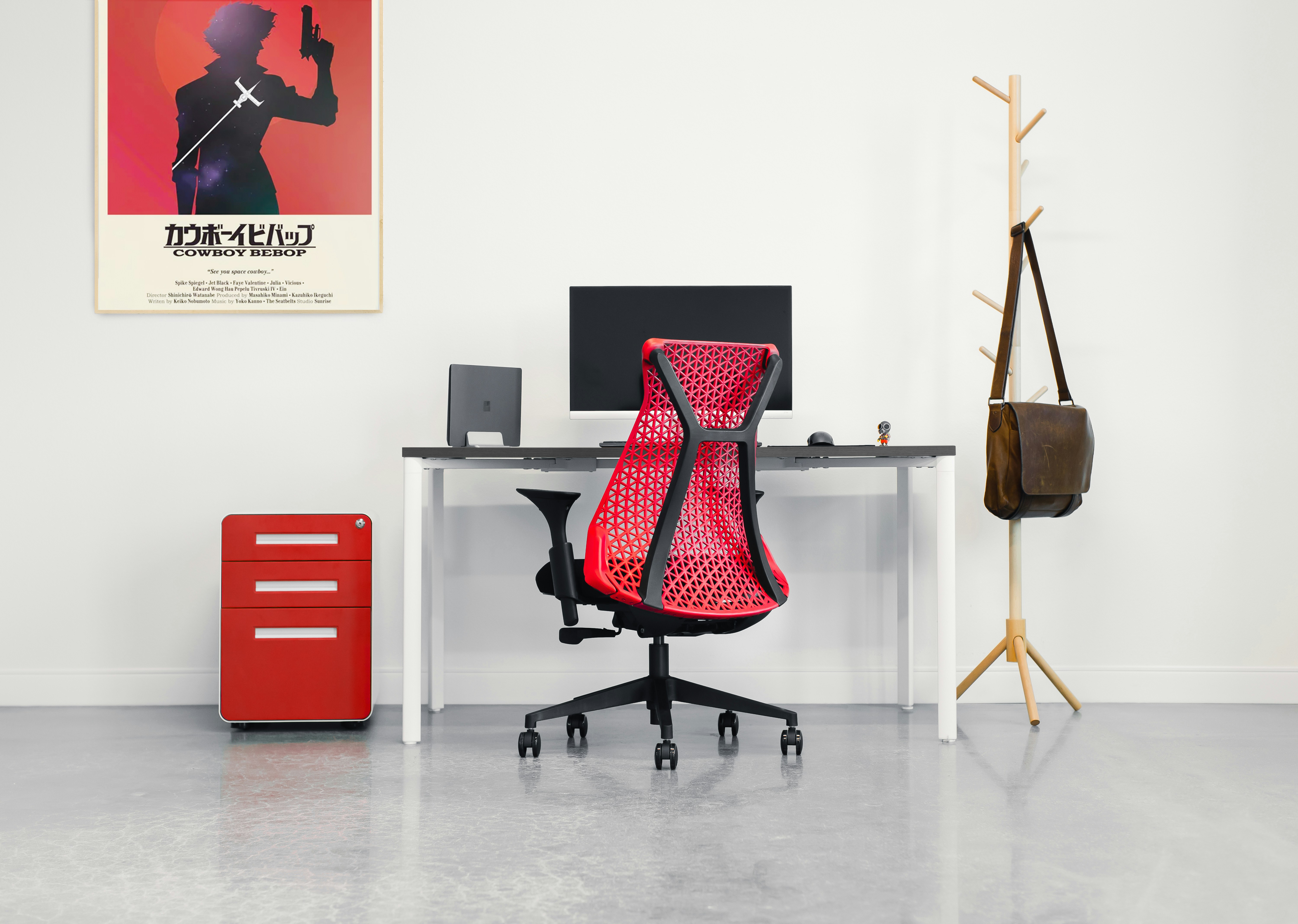 red and black office rolling chair