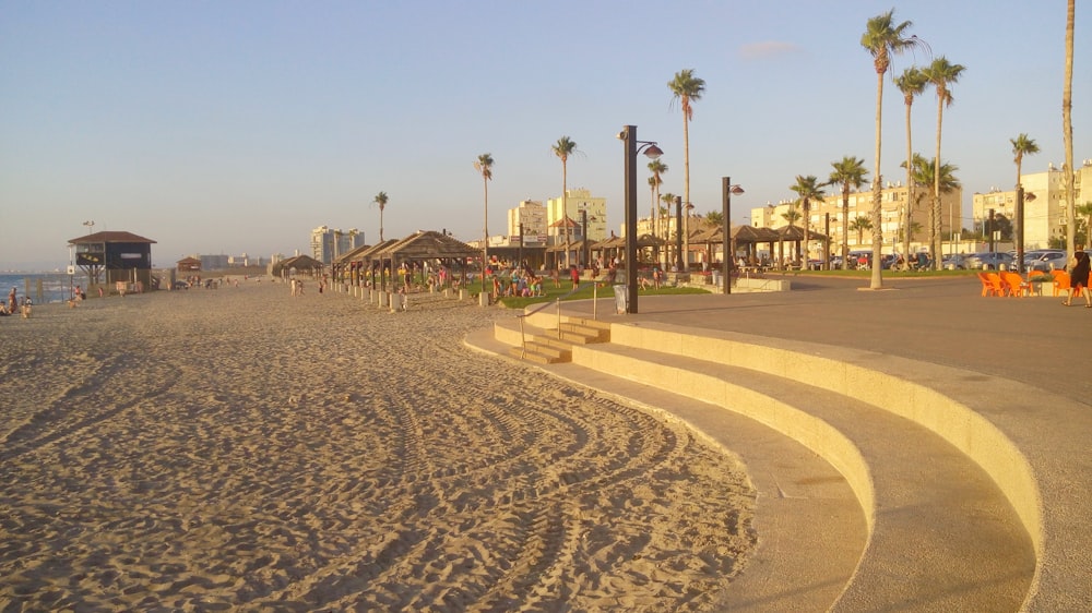 people walking on beach during daytime