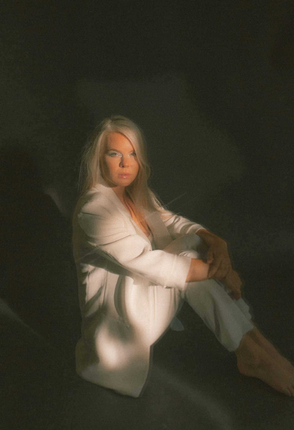 woman in white long sleeve shirt