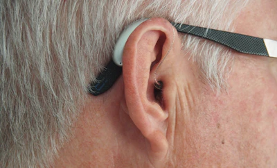 person wearing white and black sunglasses