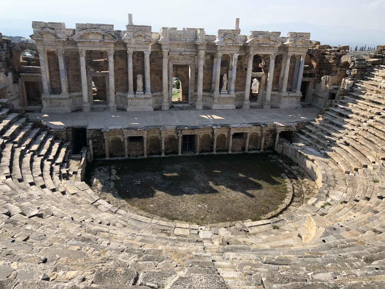 Stone tiers and stage buildings inside the ancient city of Ephesus