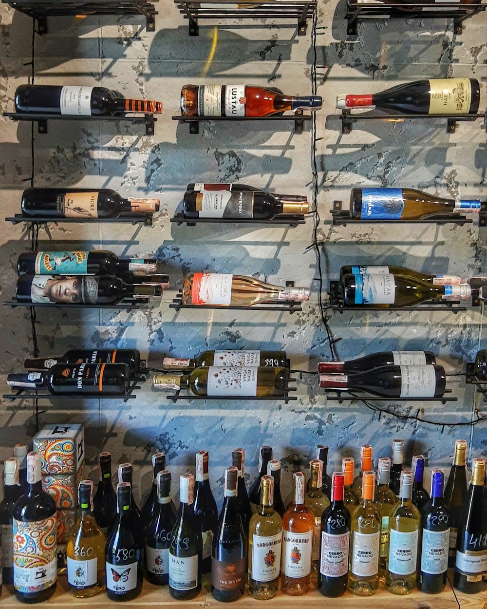 assorted glass bottles on white table