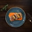 cooked food on blue ceramic plate