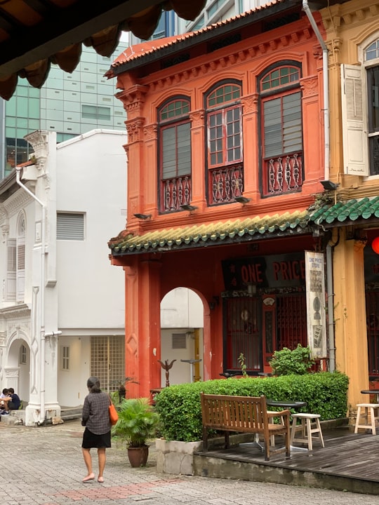 red and white concrete building in 277 Somerset Road Singapore