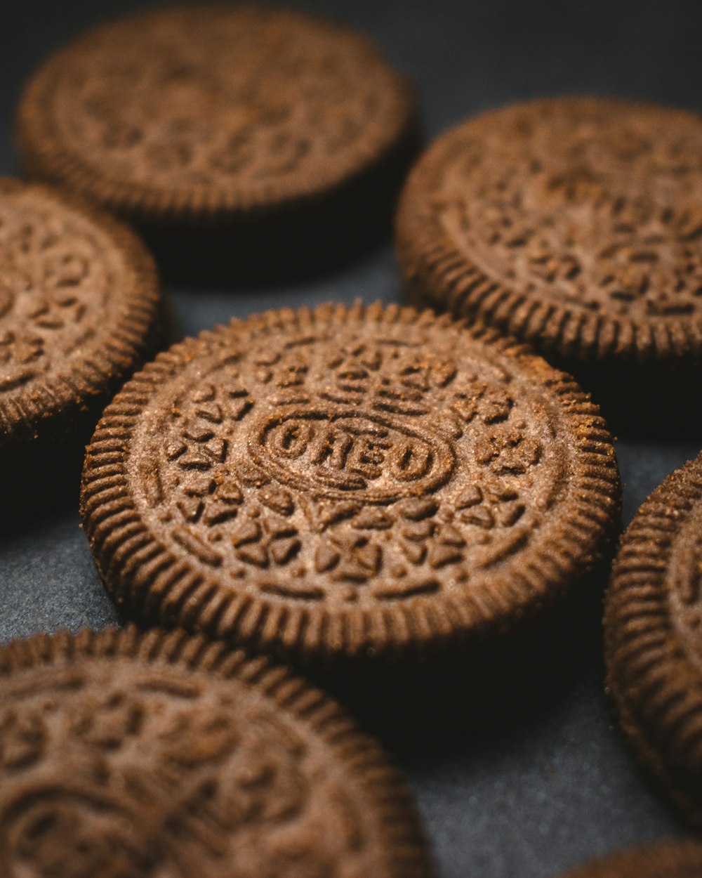 brown cookies on black textile