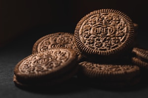 brown cookies on black surface