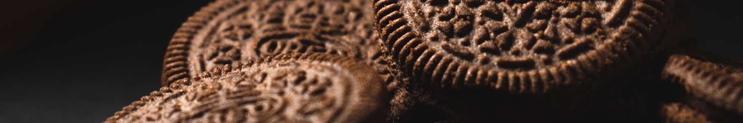 brown cookies on black surface