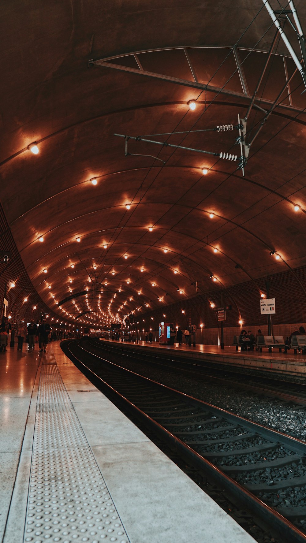 people walking on train station