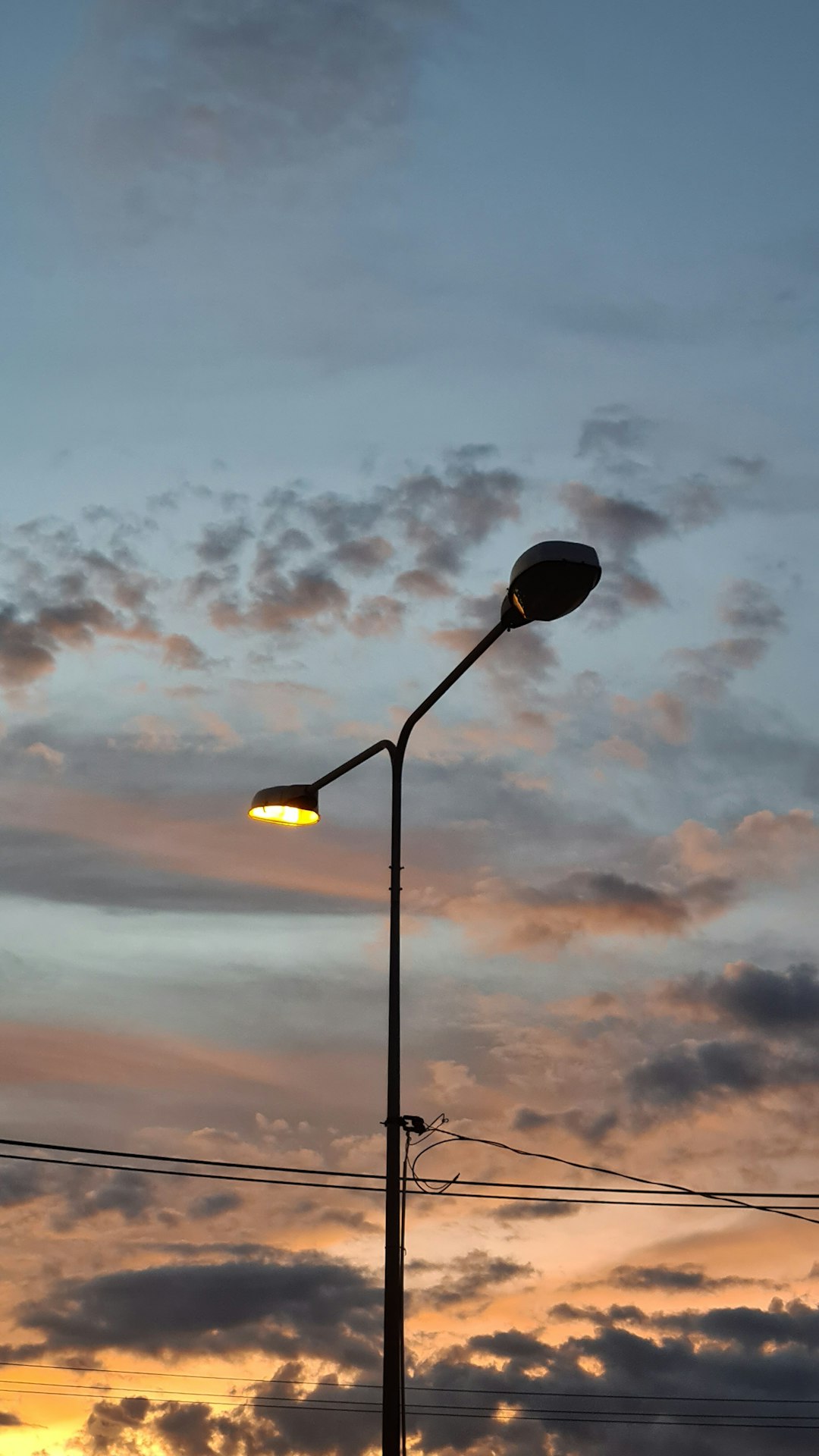 black street light under cloudy sky during daytime photo – Free Lamp ...