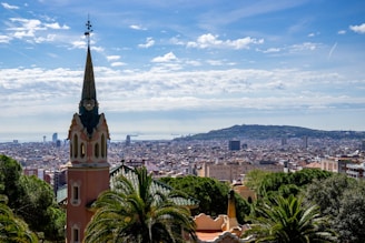 A panoramic view of a famous landmark tower with surrounding city streets and parks.