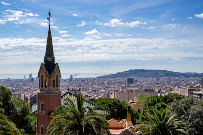A panoramic view of a famous tourist landmark surrounded by lush greenery.