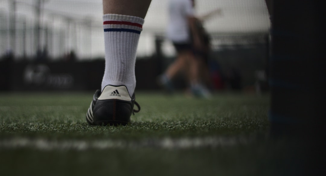 person wearing white and gray sock