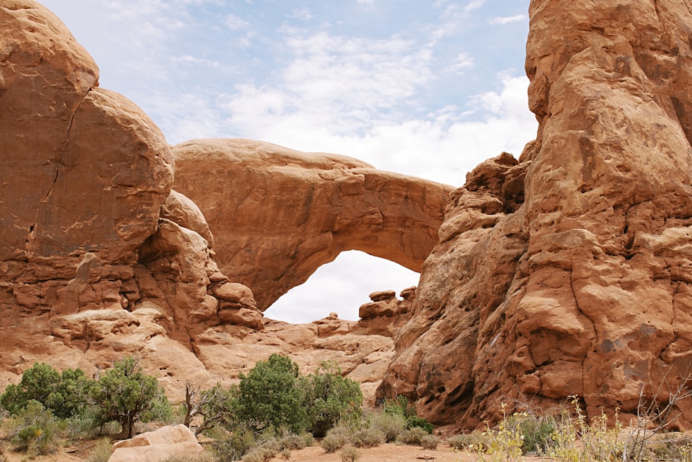 brown rock formation under blue sky during daytime