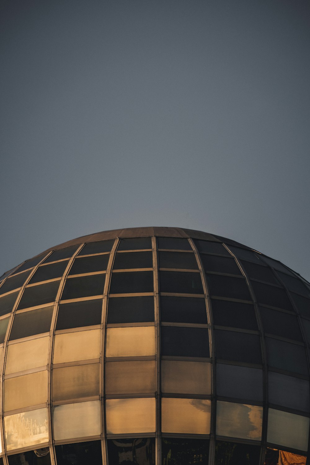 brown concrete building under blue sky during daytime