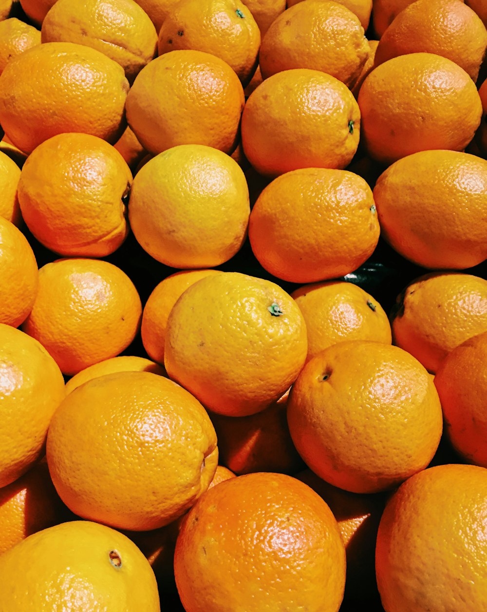 orange fruit on white table