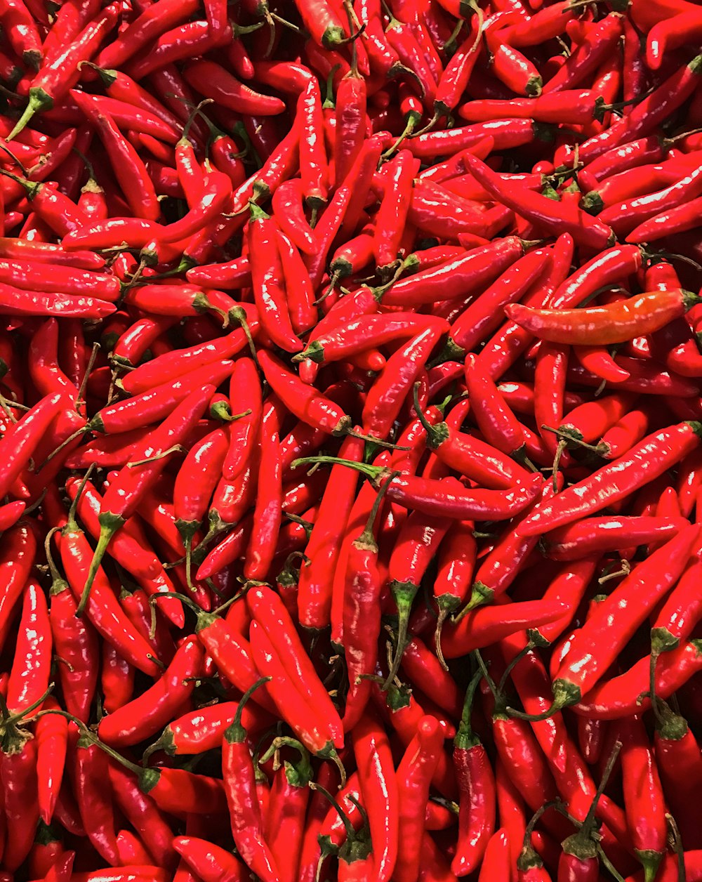 red chili lot on green grass