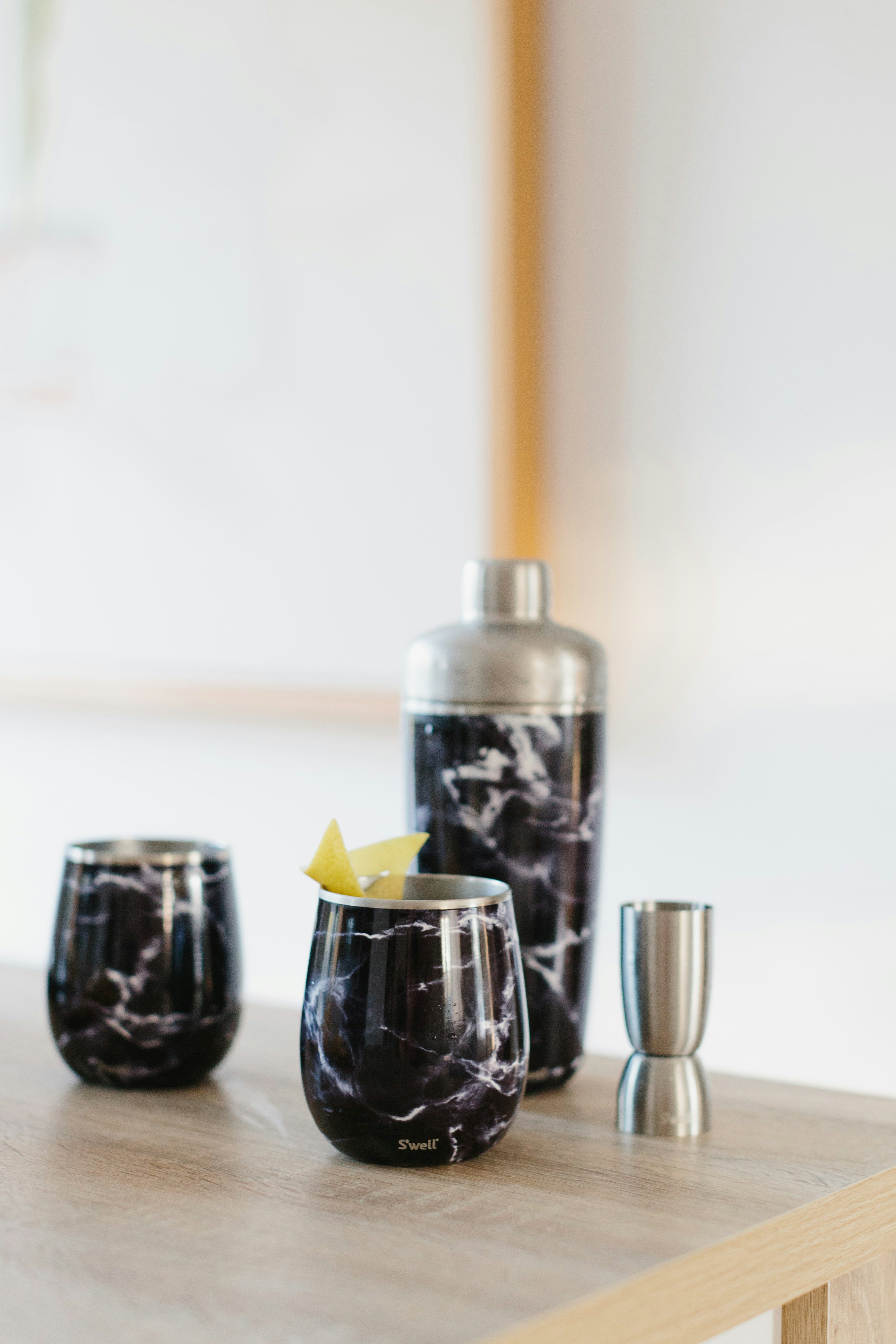 white and gold candle holder