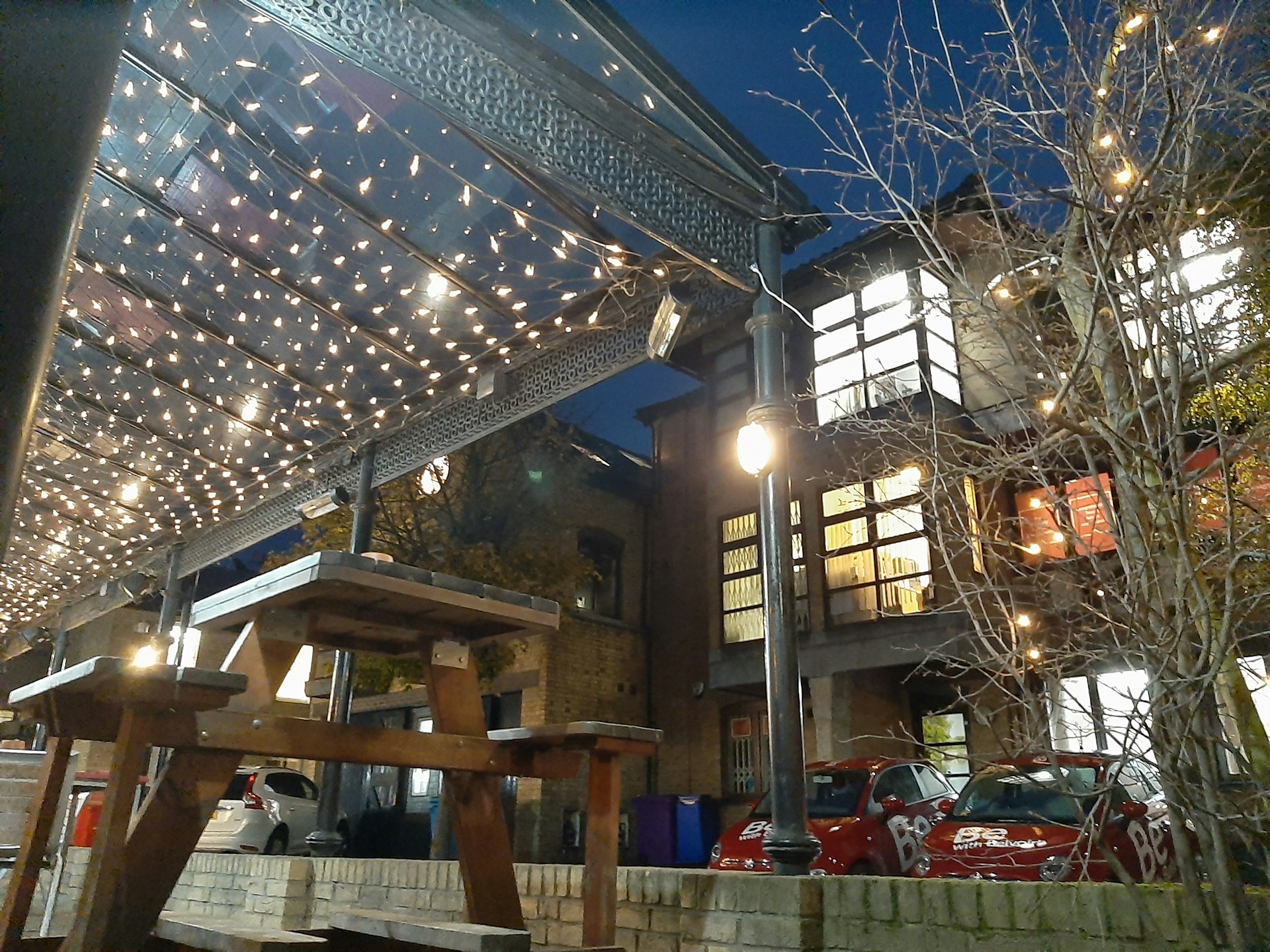 woman wearing yellow long-sleeved dress under white clouds and blue sky during daytime